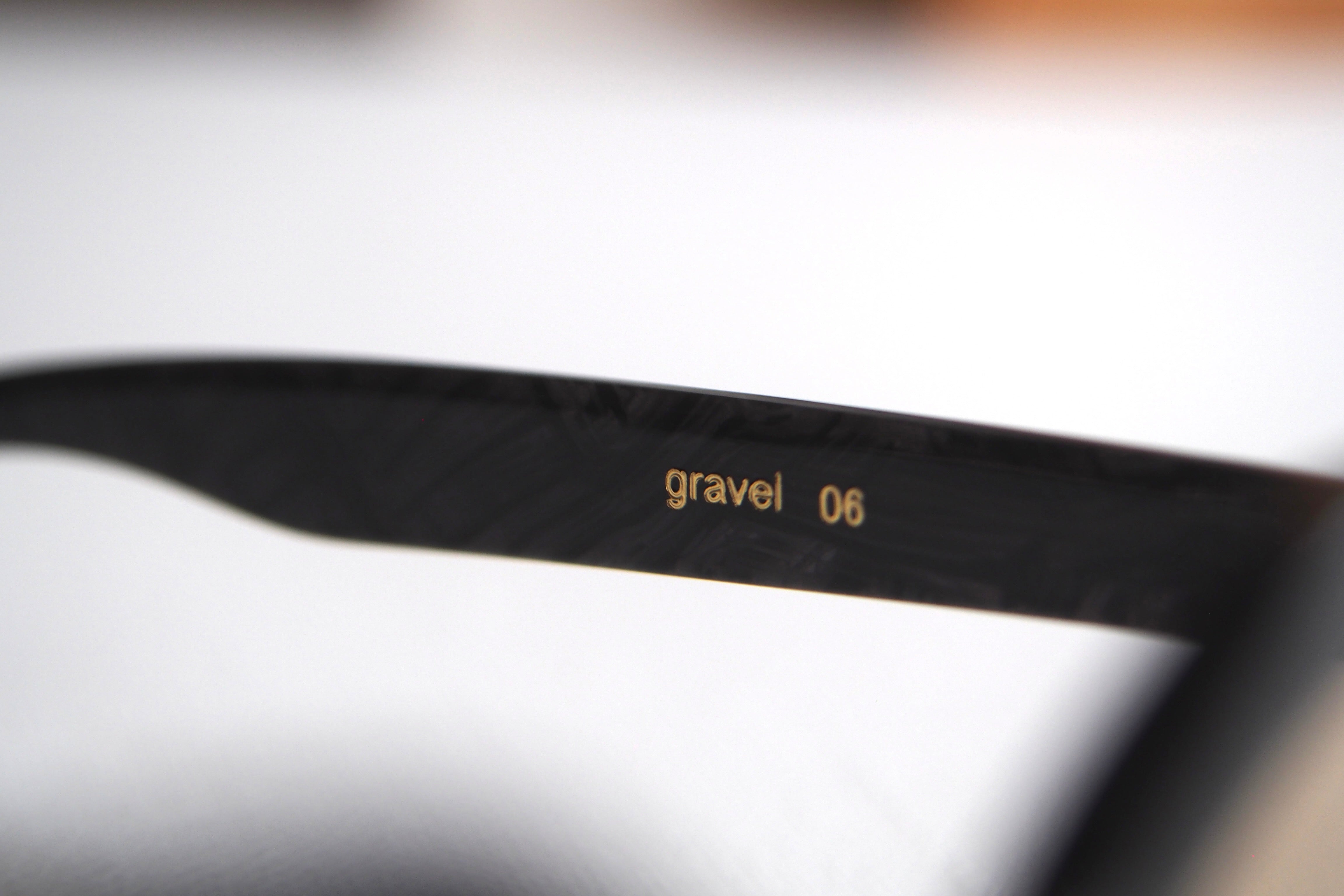 Kearny gravel 06 / black stone coarse tea lens – SUI OPTIQUE