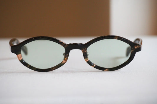 Kearny konide 1  / mix brown green clear . green lens