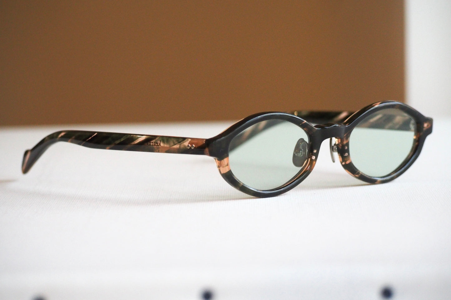Kearny konide 1  / mix brown green clear . green lens
