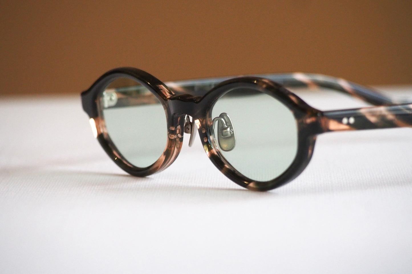 Kearny konide 1  / mix brown green clear . green lens