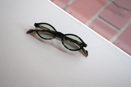 Kearny konide 1  / mix brown green clear . green lens