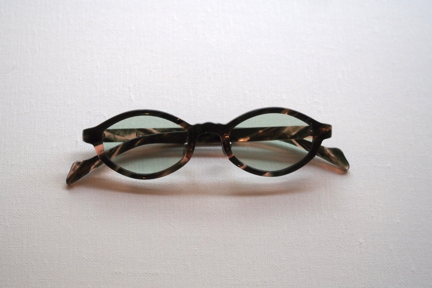 Kearny konide 1  / mix brown green clear . green lens