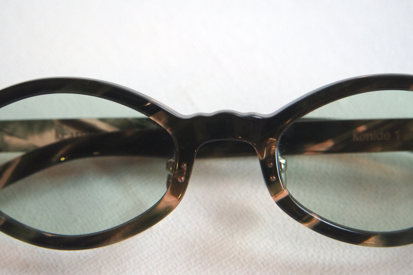 Kearny konide 1  / mix brown green clear . green lens