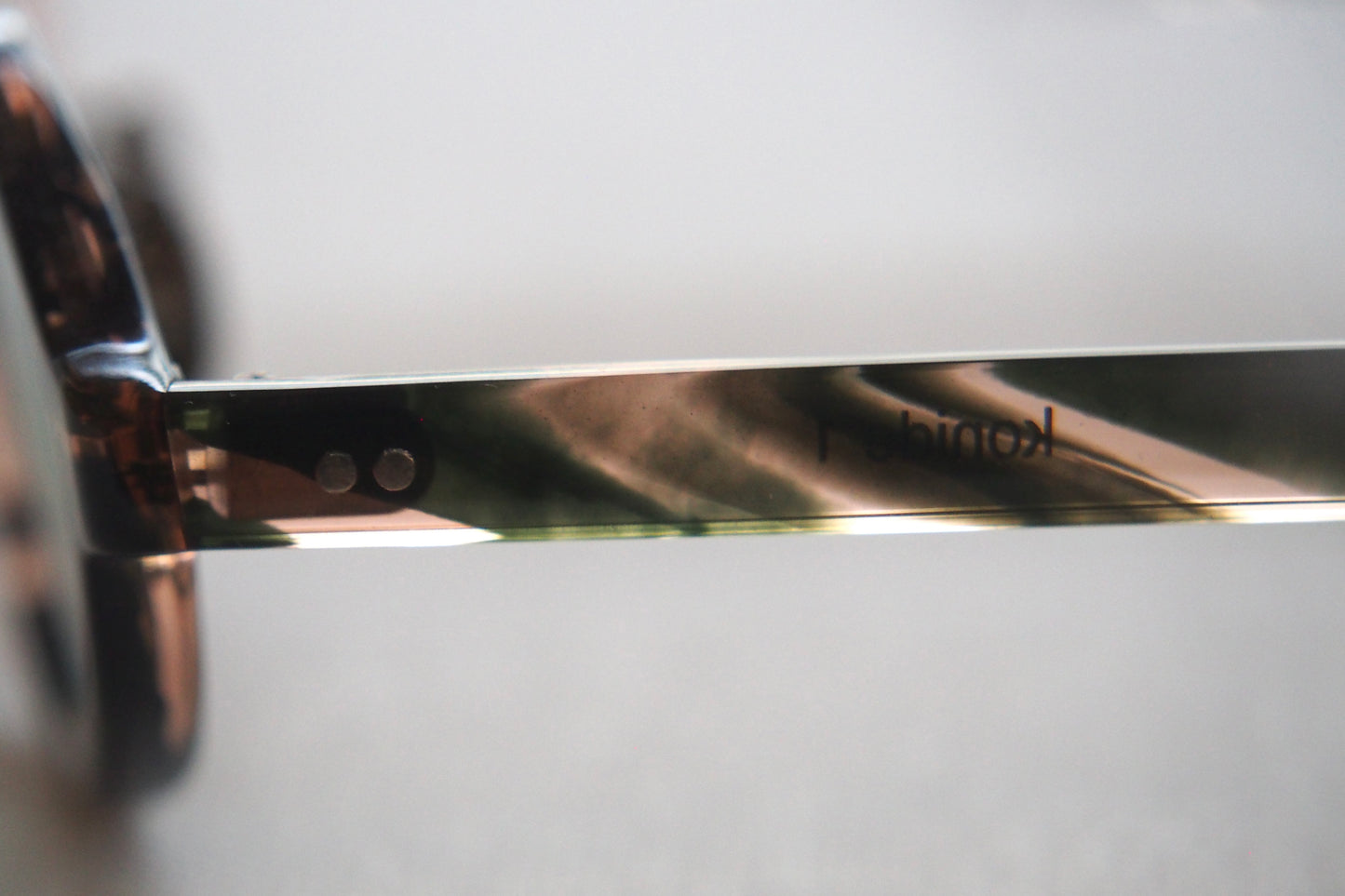 Kearny konide 1  / mix brown green clear . green lens